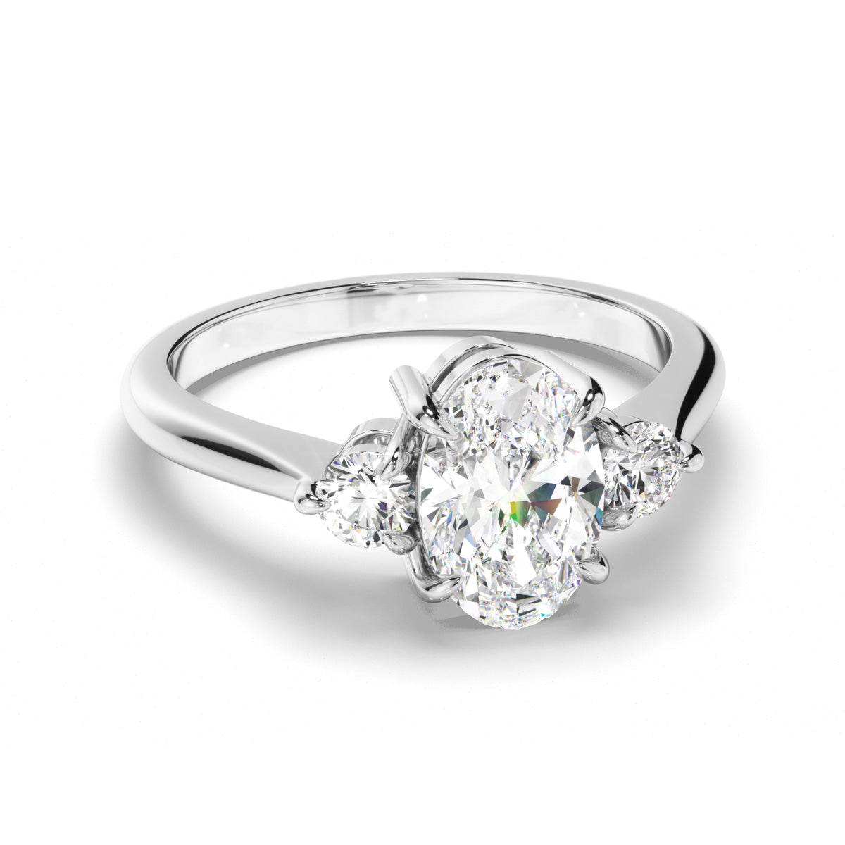 Oval Cut Diamond Trilogy Engagement Ring with Round Brilliant Sides