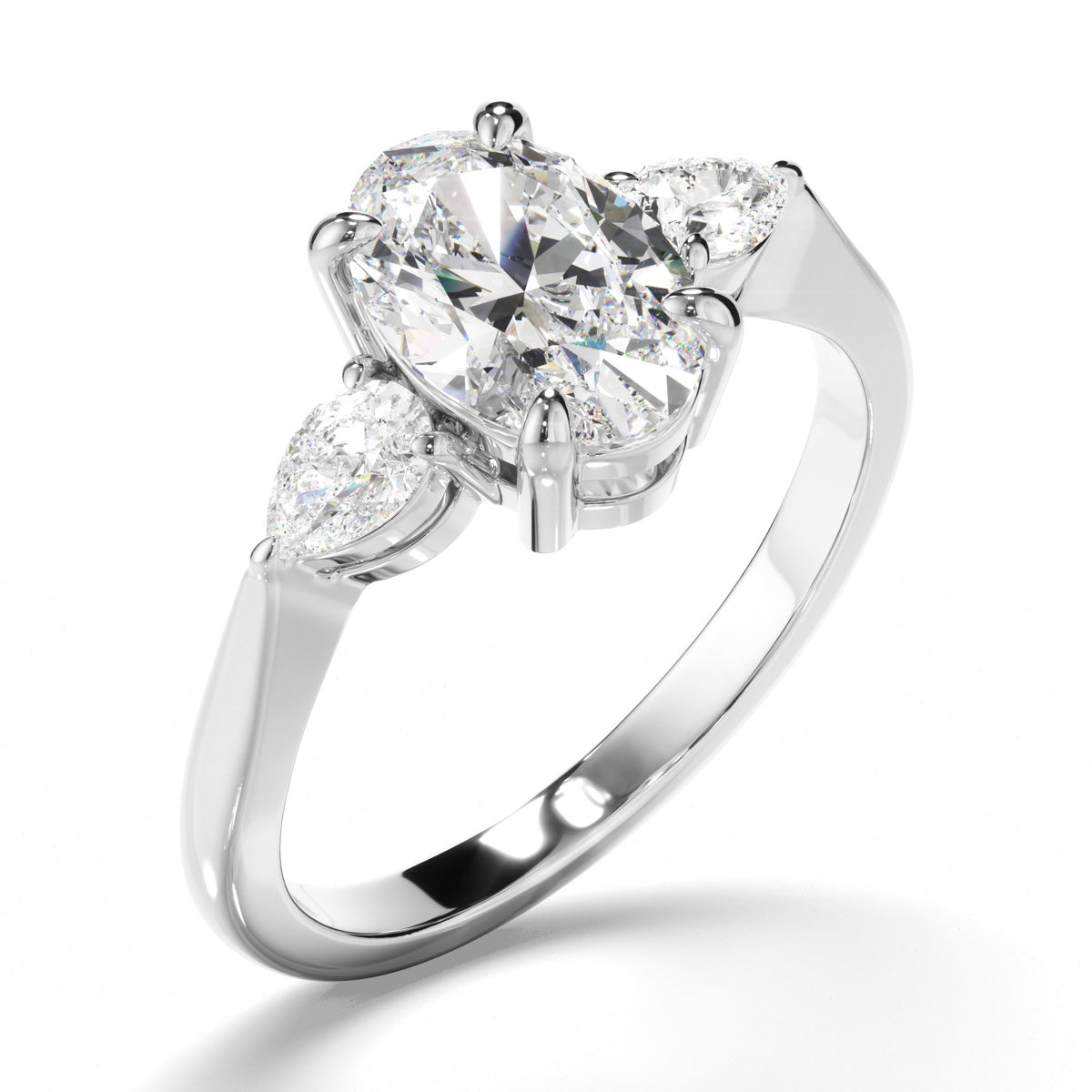 Oval Cut Diamond Trilogy Engagement Ring with Pear Sides