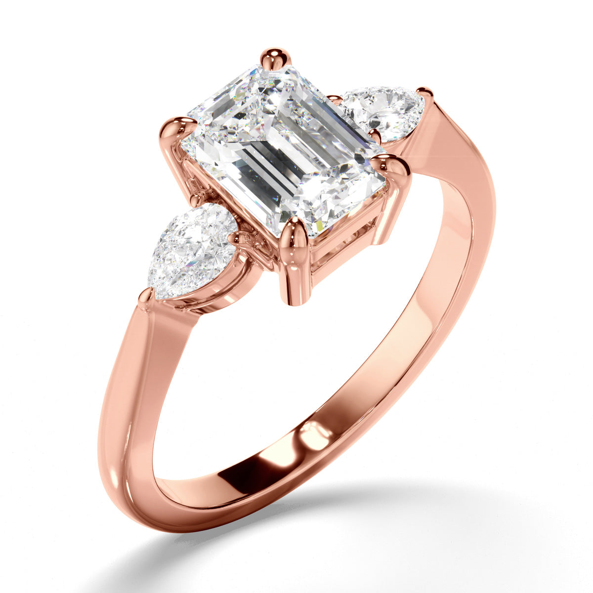 Emerald Cut Diamond Trilogy Engagement Ring with Pear Sides